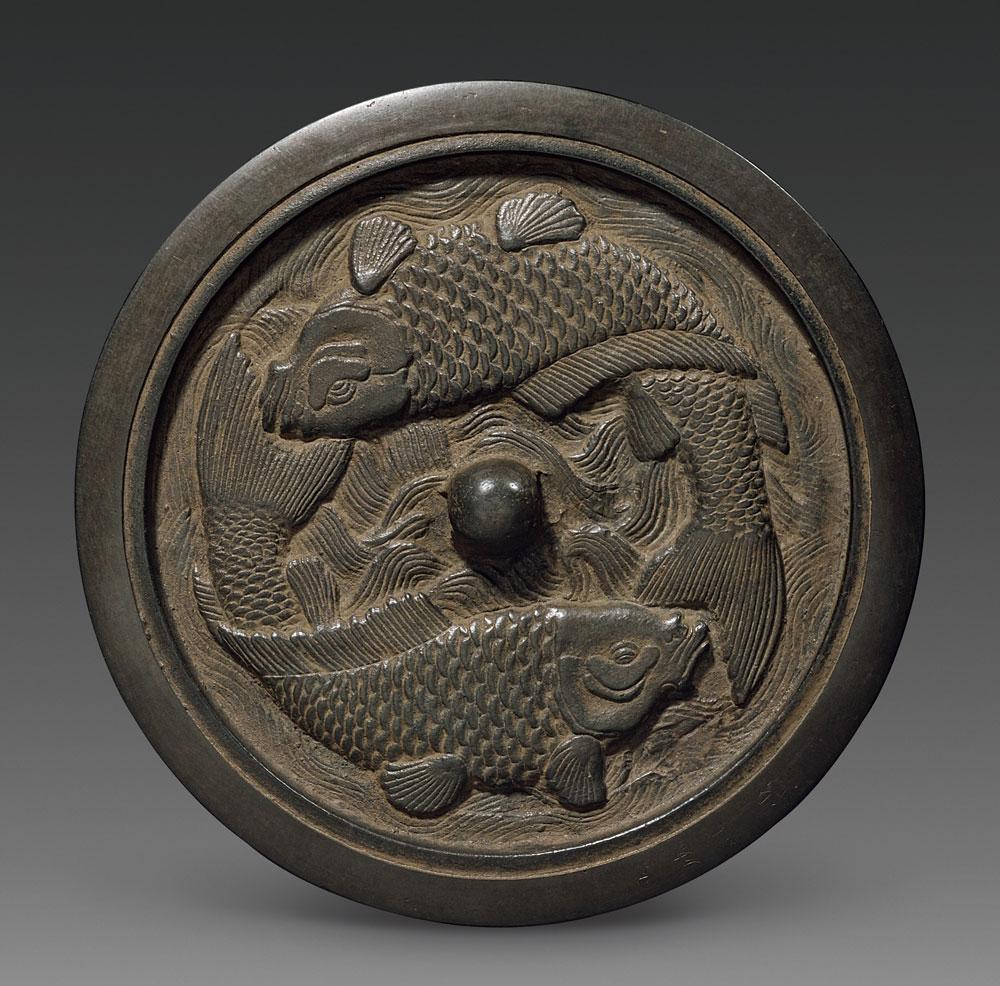 5511金代金成记押双鱼镜