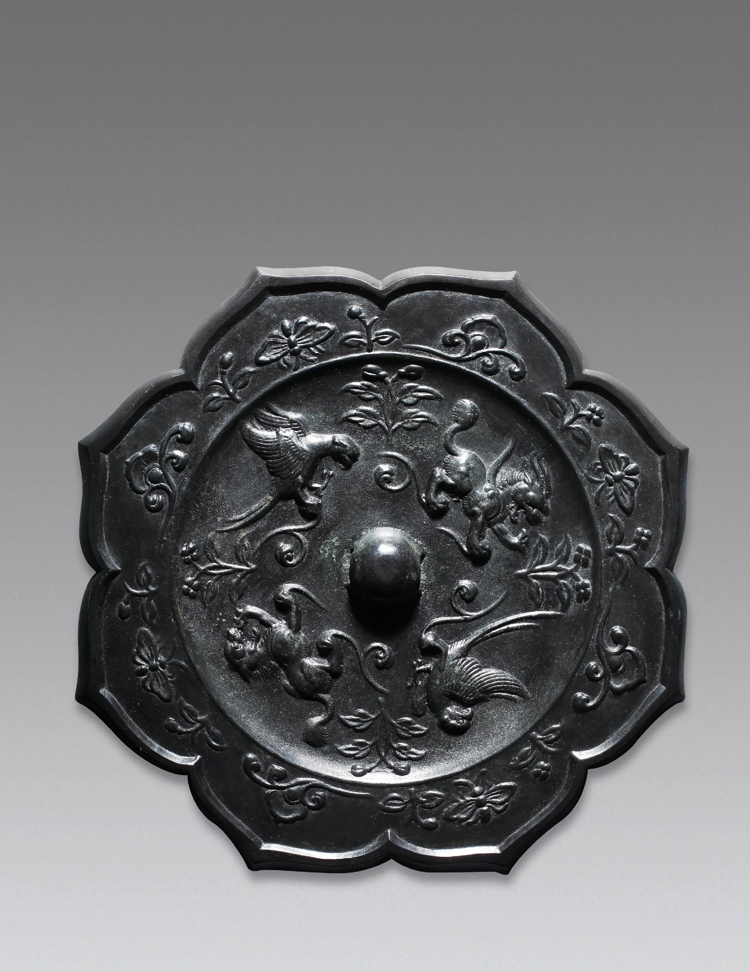 6675菱花形双鸟双兽镜