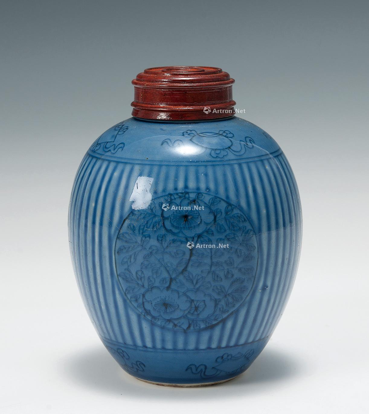 0071 康熙 孔雀绿釉地八吉祥纹罐