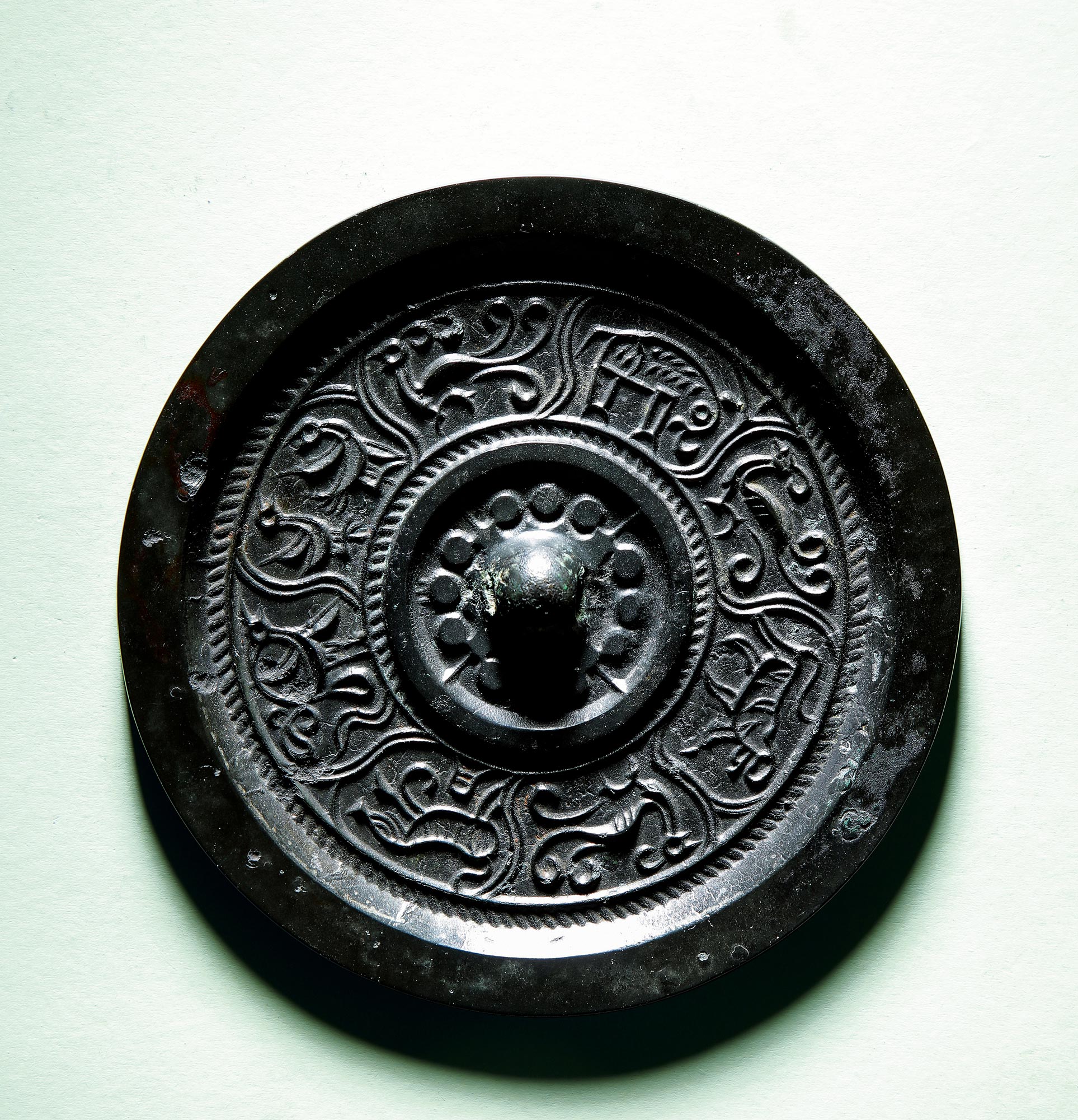 6719象纹动物纹镜