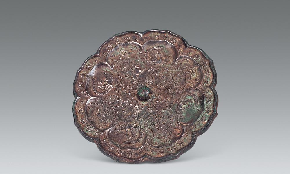 0630唐鸾凤纹菱花铜镜